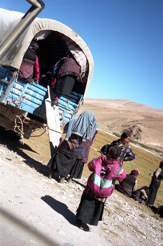 16 Local Villagers Board a Truck